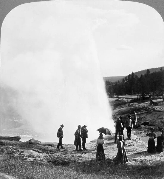 YELLOWSTONE PARK: GEYSER. Spectators watching a geyser eruption in Yellowstone National Park, Wyoming. Stereograph, c1907