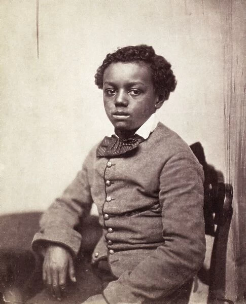 YOUNG BLACK BOY, c1860. American studio portrait of an unidentified young boy, c1860