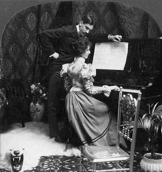 YOUNG COUPLE, 1900. He: Darling, Let Us Sing, I Will Love Thee Ever. Stereograph