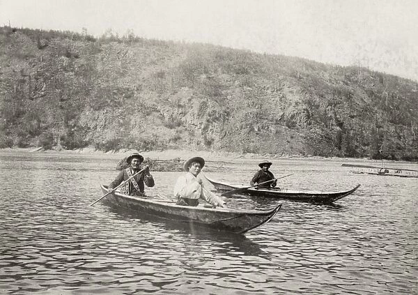YUKON: CANOE, c1897. A Native American chief with his sons in canoes on a lake in Yukon Territory