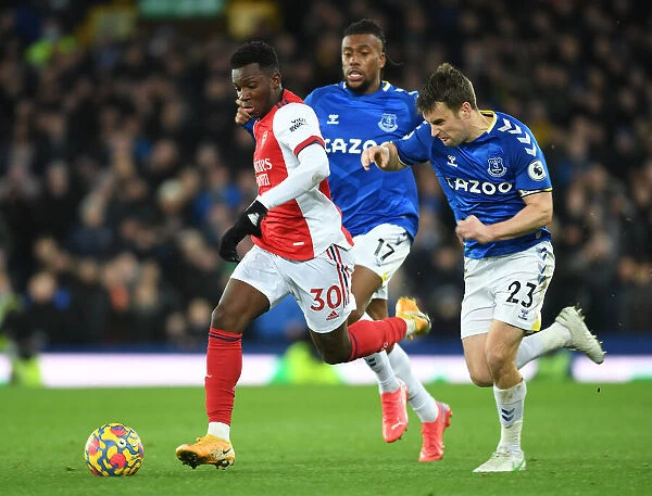 Arsenal's Eddie Nketiah Outmaneuvers Everton's Seamus Coleman in Premier League Clash