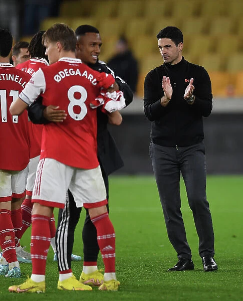 Mikel Arteta Celebrates with Arsenal Fans after Wolverhampton Wanderers Win