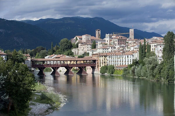 Italy, Veneto, Bassano del Grappa, view towards Ponte degli Alpini or Ponte Vecchio wooden bridge designed by Palladio, spanning the River Brenta