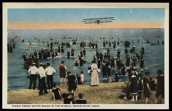 Postcard of Airplane Flying over Beach at Cedar Point. ca. 1916, FINEST FRESH WATER BEACH IN THE WORLD, CEDAR POINT, OHIO