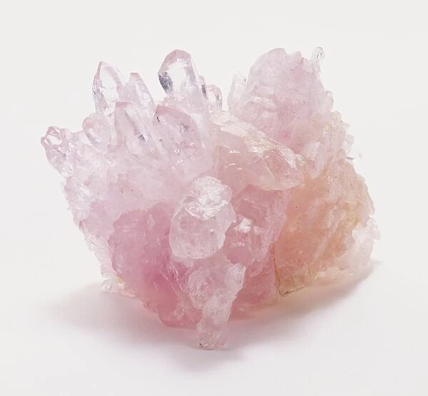 Rare rose quartz crystals set in massive rose quartz, close up