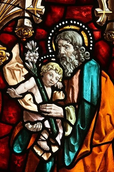 San Jeronimos church. Stained glass. Joseph and Jesus