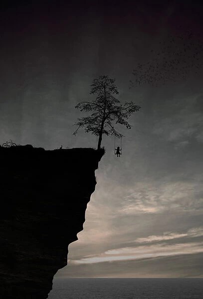 Child swinging on the cliff