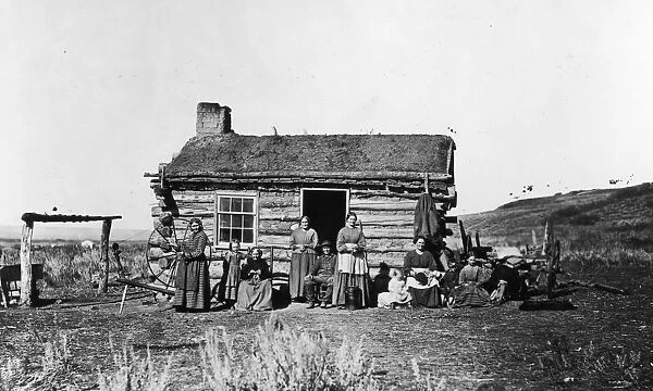 Cabin. A Photograph of a Family in Front of their Cabin circa 1840