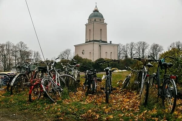 View on Suomenlinna Church with parked bicycles on a foreground, Finland