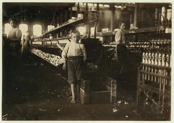 8 year old Leo, only 4 feet tall, picks up bobbins for 15 cents a day at Elk Cotton Mills