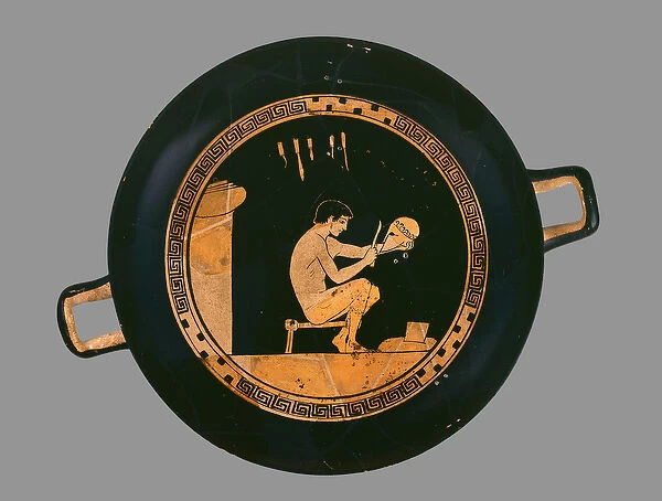 Attic red-figure cup depicting a young helmet-maker, from Orvieto, c. 480 BC (ceramic)