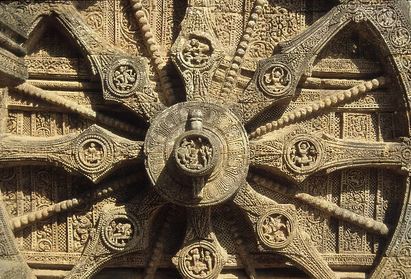 Chariot wheel on the base of the Surya Temple (stone)