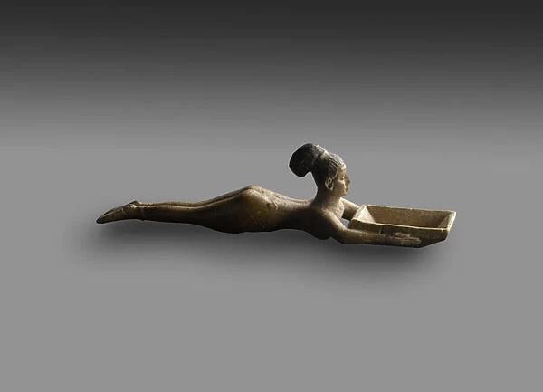 Cosmetic spoon in the shape of a swimming girl, from a tomb in Sanam, Nubia, Late Period
