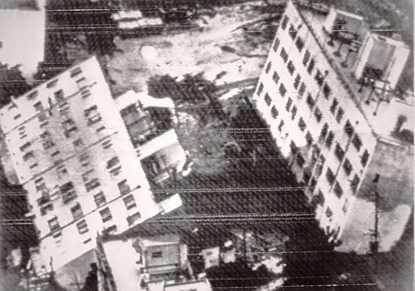 Earthquake in Japan in 1964 - apartment blocks tumble in Niigata (b  /  w photo)