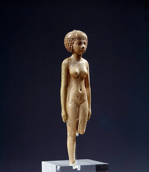 Egyptian antiquite: statue of naked ivory woman. 3rd intermediate period. Low epoch