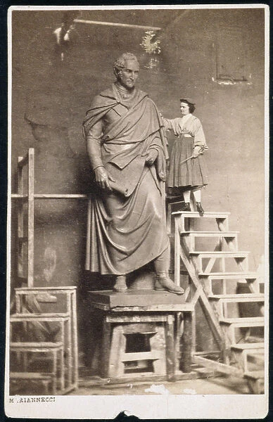 Harriet Hosmer (1830-1908) on ladder with her sculpture of Thomas Hart Benton (1782-1858)