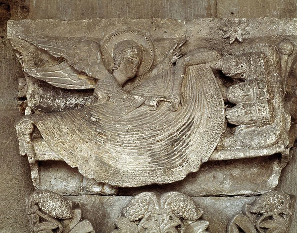 The Magi asleep with an angel awaking them and pointing towards the star of Bethlehem (carved capital)