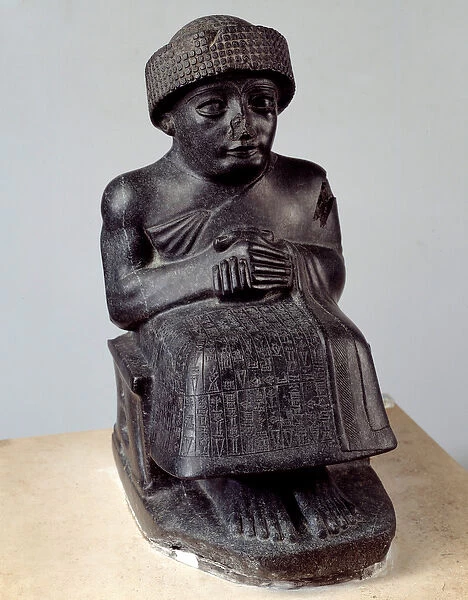 Mesopotamia: statue of the god Ningishzida representing Gudea sitting, prince of Lagash