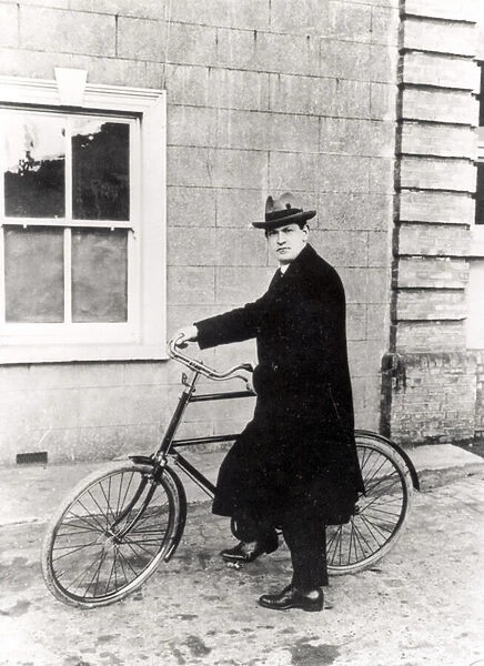Michael Collins (1870-1922) with his famous bicycle (b  /  w photo)