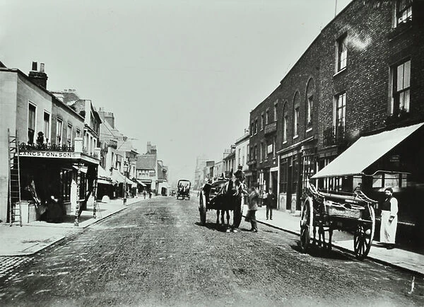 Putney High Street, looking towards bridge, 1885 (b  /  w photo)