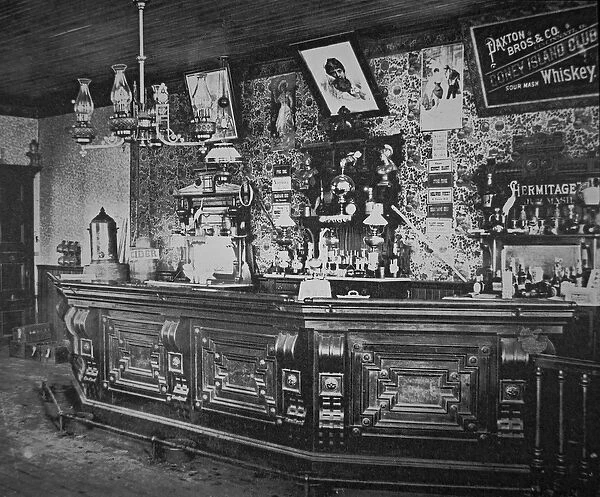 Saloon bar at Socorro, New Mexico, c. 1880 (black and white photograph)