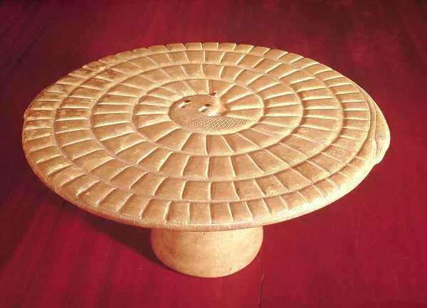 Snake shaped gaming board used for the game mehen, Thinite Period (alabaster)