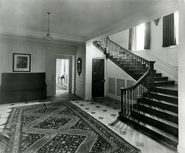 The staircase hall, Temple Dinsley, Hertfordshire, from The English Manor House (b / w photo)