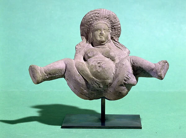 Statuette of a woman giving birth, given to pregnant women for a successful delivery