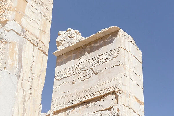 Stone carved zoroastrian symbol of Faravahar, Persepolis, Iran (stone)