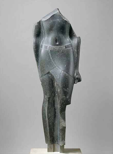 Torso of a Ptolemaic King, inscribed with cartouches of a late Ptolemy, 80-30 BC (basalt)