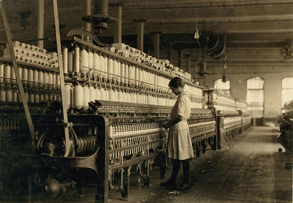 Young Teen Girl Working as Spinner at Cotton Mill, West, Texas, USA, c