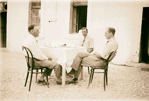 Men seated table visit Prince William Sweden