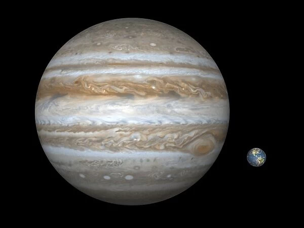 Artists concept comparing the size of the gas giant Jupiter with that of the Earth