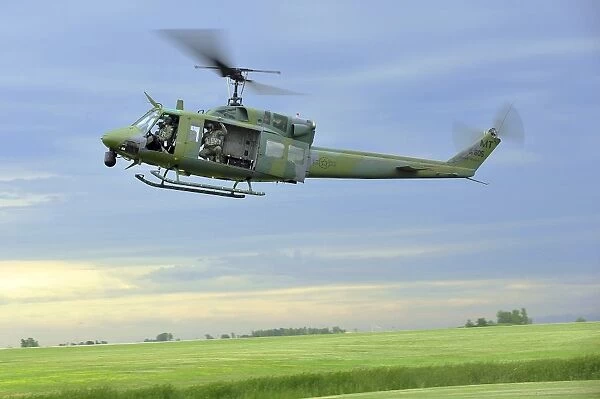 A UH-1N Huey helicopter prepares to land at Minot Air Force Base, North Dakota