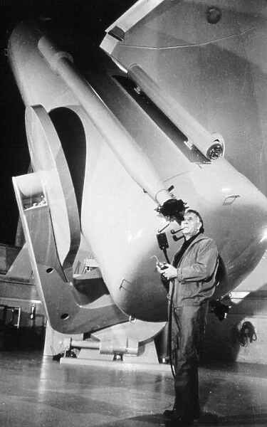 Edwin Powell Hubble (1899-1953), American astronomer, in the obsevatory