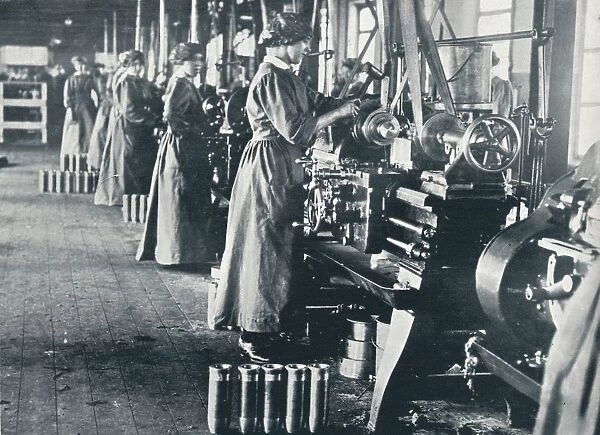 Girl munition workers at their lathes in a Scottish mill, c1914