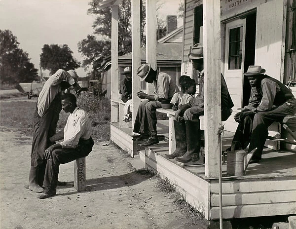 Haircutting in Front of General Store and Post Office on Marcella Plantation, Mileston, M