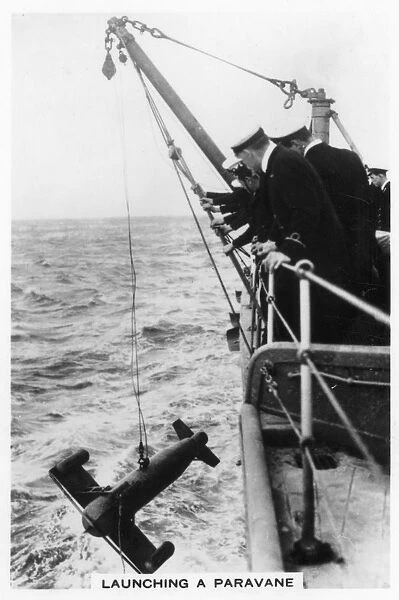 Launching a paravane from the battleship HMS Rodney, 1937