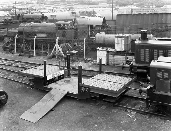 Laycock Engineering rail mounted loadlifta, Bicester sidings, Oxfordshire, 1959. Artist