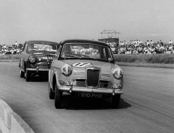 Riley 1. 5, Grace leads Jack Sears in Austin Westminster at Silverstone 1958. Creator: Unknown