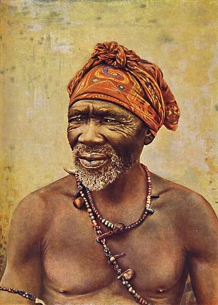 A South African medicine man, 1912. Artist: GW Wilson