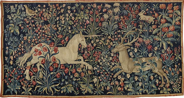 A unicorn and a stag in a field of flowers, c. 1500. Creator: Anonymous master