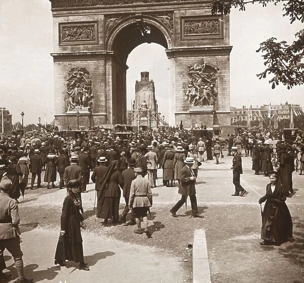 Victory celebration, civilians at the Arc de Triomphe, Paris, France, July 1919