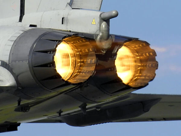A Typhoon F2 fighter ignites its afterburners whilst taking off from RAF Coningsby
