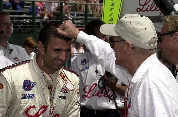 Paul Newman and Christian Fittipaldi prior to second round qualifying for the Molson Indy Vancouver. Concord Pacific Place, Vancouver, B. C. Can. 27 July, 2002