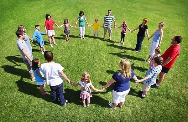 Group Holding Hands In A Circle