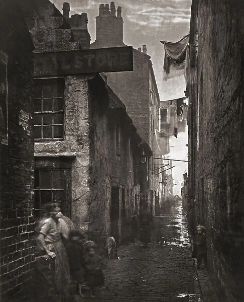 Old Vennel, off High Street, Glasgow, Scotland in the 1870 s. Photograph from The Old Closes and Streets of Glasgow, by Scottish photographer Thomas Annan 1829-1887