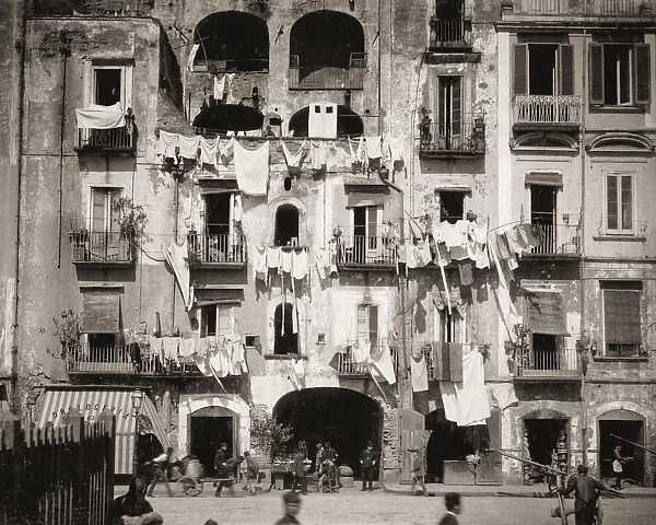 A street scene in Naples, Italy, in the late 19th century. After a work by German photographer Giorgio Sommer, 1834 -1914