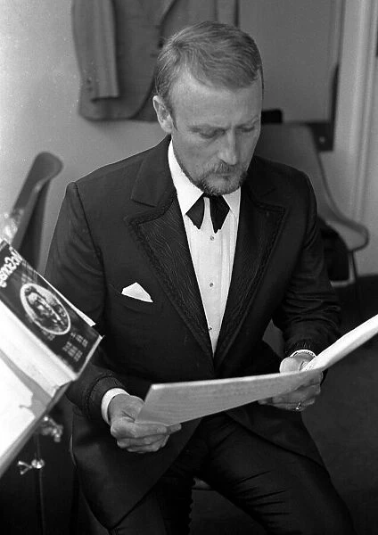 Actor Edward Woodward seen here in his dressing room rehearsing a William McGonagall poem