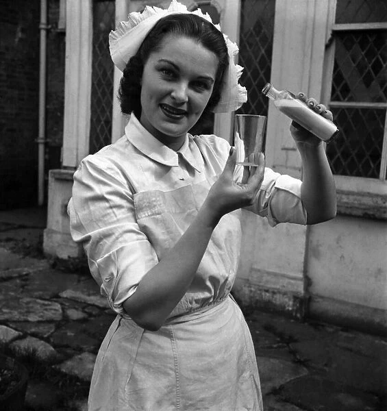 Actress his a Daniely seen here dressed as a nurse on the set of the film '
